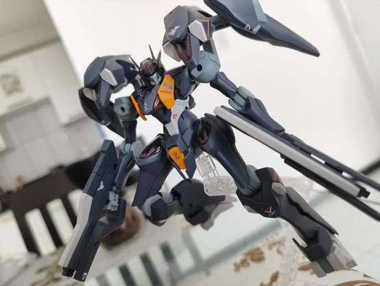 Pharact Gundam model finished facing forward while dual wileding his guns, he is in flying position with the arms by the side and the guns facing down.