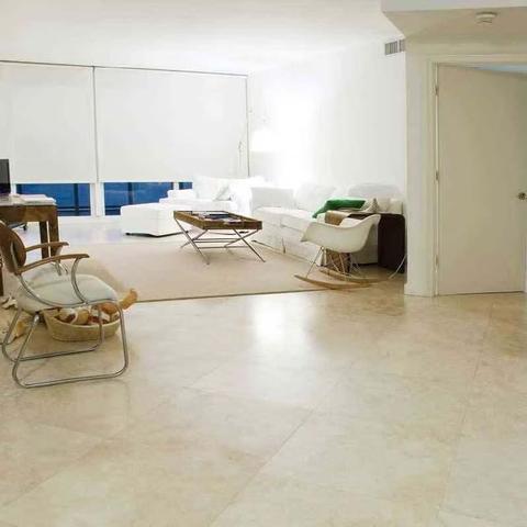 Premium Travertine stone slabs displayed by leading Dubai supplier, ideal for pool surrounds and patios.