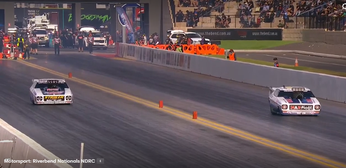 Two Holden Monaro top doorslammer drag cars on track at Dragway At The Bend