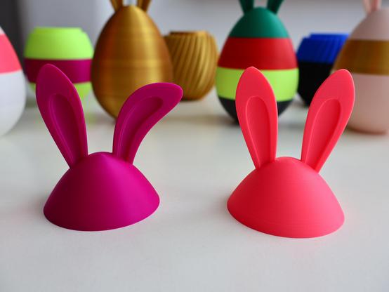 Plain top section of easter egg with perky (left) and floppy (right) bunny ears