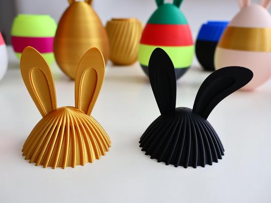 Ribbed top section of easter egg with perky (left) and floppy (right) bunny ears