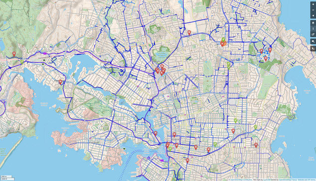 OpenStreetMap view of Victoria, British Columbia with the CycleOSM layer for cyclists.  There are also many red pins for open open map notes, and 8 green pins for recently closed notes.