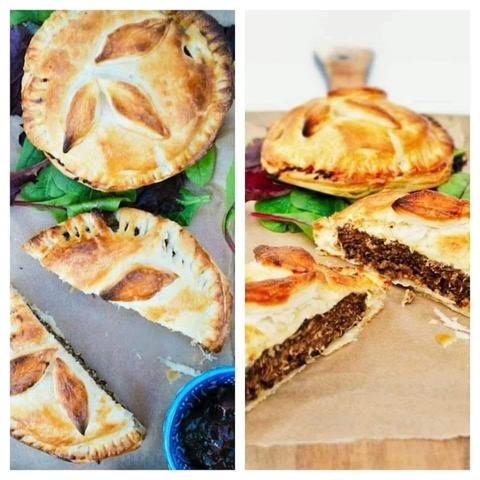 Puff pastry burger pies topped with a leaf design on a wooden board.