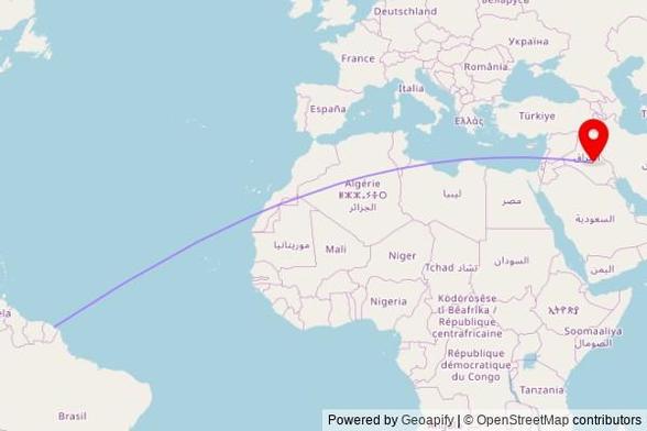 A map showing the great circle route from Cayenne in France to a map pin at The Shrine of Sayed Mohamed Ibn Hamzeh, جسر الهندية الثاني, Hindiya, Iraq