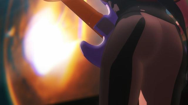 A different shot of Umiri Yahata/Timoris, a brown haired chick. However, yo cannot see her hair or face, as the shot is focused on her butt, though you can see the back side of her guitar as well.