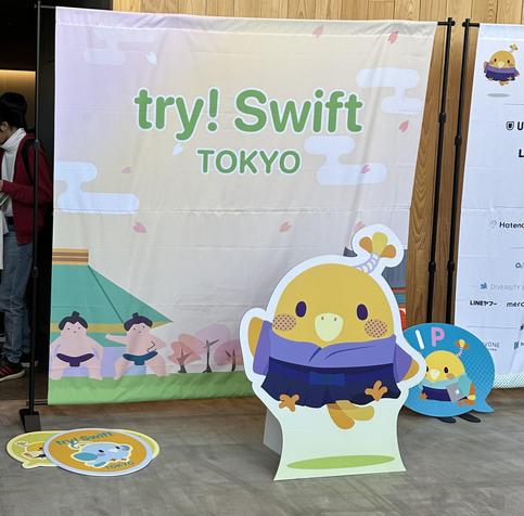 Banner with text try! Swift, and popup of the bird mascot in front