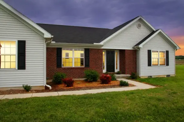 profitable return on investment real estate photo of a home at sunset
