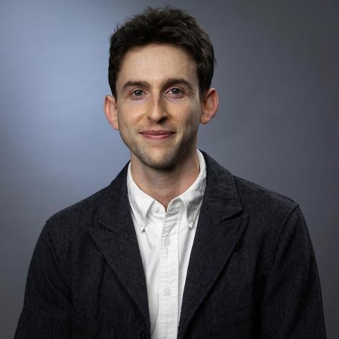 Portrait style photo of historian Aaron Gluck-Thaler