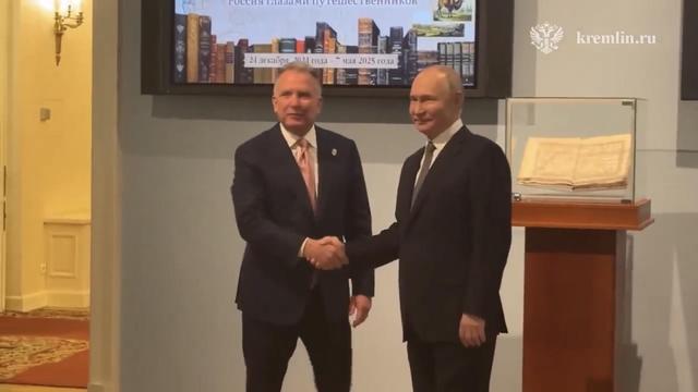 Steven Witkoff shakes hands with Vladimir Putin before sitting down for a meeting about Putin's demands for peace in Ukraine.