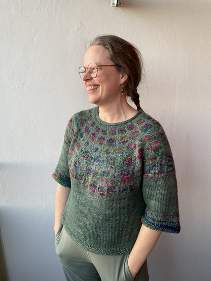Me in a green+variegated wool sweater 