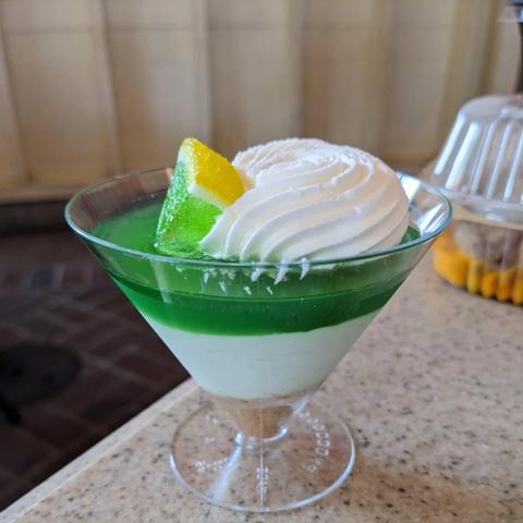 Lime parfait - layers of graham cracker crust, lime cream cheese mousse, and lime-orange gelée topped with chantilly.
