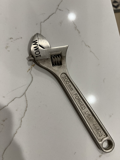 A modified 10mm crescent wrench
