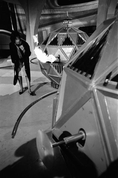 14th April, 1965: Legendary Doctor Who producer Verity Lambert confronts a flame-belching Mechanoid at Ealing Studios, London.