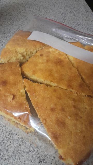 A gallon zip top bag full of cornbread leftovers