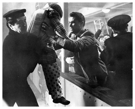 The Time Tunnel: Rendezvous With Yesterday

As the Titanic sinks, time traveller Doug Phillips (Robert Colbert) helps young Marcel (Gerald Michenaud) into a lifeboat.