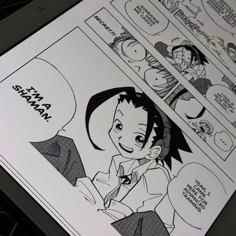 A manga panel for Shaman King showing the protagonist Yoh Asakura introducing telling Manta he is a shaman.
