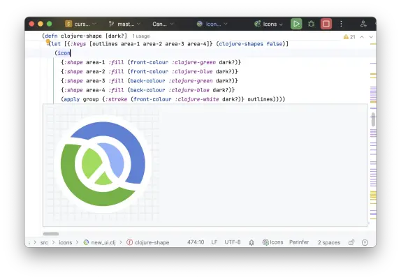 A Clojure editor with the Clojure logo displayed inline.