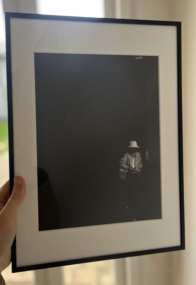 Hand holding a frame