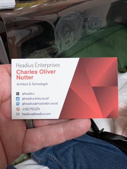 Headius Enterprises business card