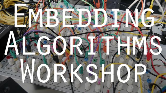 A photo of a modular synth with "Embedding Algorithms Workshop" written on it. 