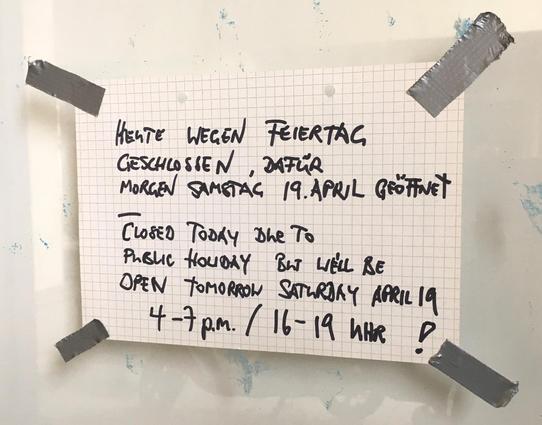 Note on the door of our shop explaining that it's closed on Good Friday and instead open the next day, Saturday April 19, from 4-7pm.