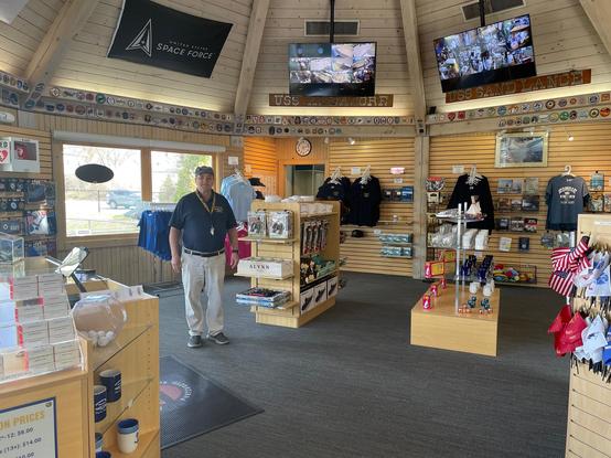 Joe, our Operations Director, stands in the middle of our gift shop.