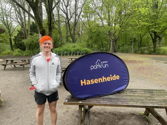 Me next to the Hasenheide parkrun lozenge. I am smiling even though I have had three hours’ sleep