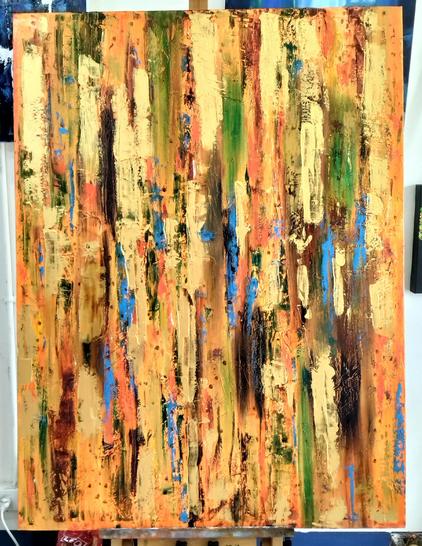 an abstract painting, it is streaks of orange and gold and some blue, coming down vertically  