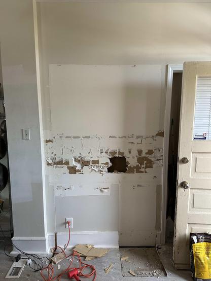 Drywall wall in need of repair.