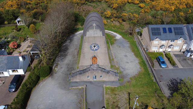 Low drone view of the church. The form is often said, even in official circles, to be an 'upturned boat', but this is questionable, as the style is seen elsewhere, though rarely. 
