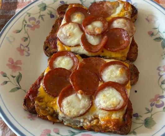 Pepperoni pizza with Mozzarella but made on top of toast instead of dough 
