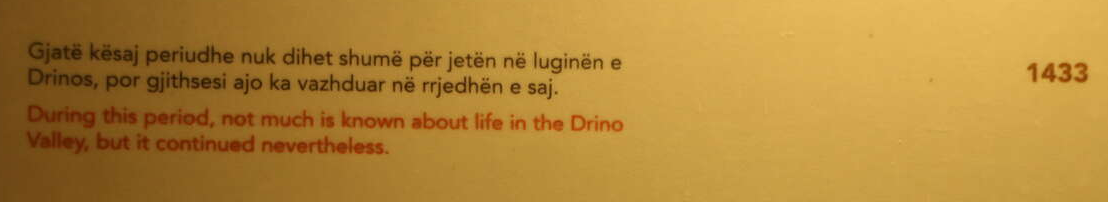 museum info sign saying "nothing much is known about this period in the Drino valley, but life continued nevertheless." 