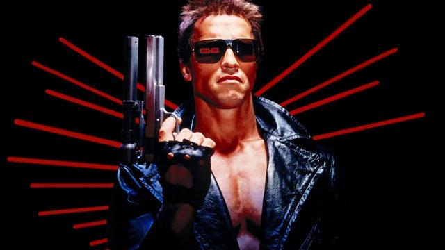 Filmstil Terminator. Zu sehen ist Arnold Schwarzenegger gekleidet in Lederjacke mit Sonnenbrille und Waffe in der rechten Hand. Im Hintergrund sind rote Neonröhren zu sehen.