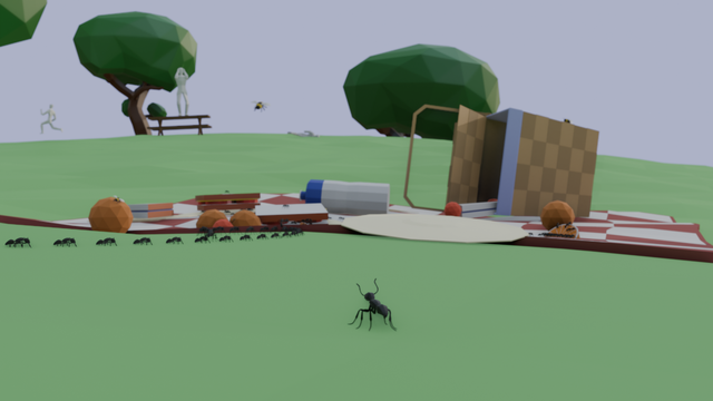 A low poly scene depicting a picnic in a disarray, as a stream of ants descend upon a red and white checquered picnic blanket with fruit, sandwiches, and paper plates scattered everywhere from an upturned basket. A couple of bees have also found the scene and are investigating an orange. In the distance near the top of a hill near several trees is a park bench, with an anxious person standing on top, holding their head as they look back toward the picnic. Beyond them, another person is sprinting out of frame. In the foreground, a nearby bee extends her antennae toward the scene