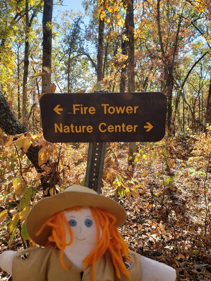 Ranger Sarah at a trail junction. She will continue down the Fire Tower Loop by heading to the Nature Center.
— at Roaring River State Park, Missouri.

