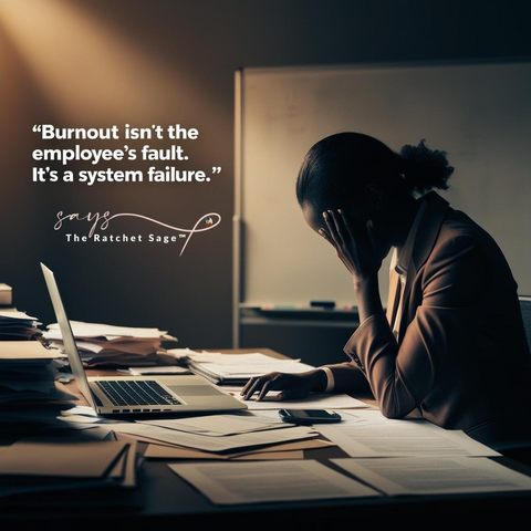 A woman sits at a cluttered desk with her head in her hand, looking stressed. Papers and folders are scattered around a laptop. A quote on the image reads, “Burnout isn’t the employee’s fault. It’s a system failure,” says The Ratchet Sage™.  Image credit: The Ratchet Sage™ (Canva) - "Burnout is a system failure." under the following license: Authentic Distinction™ exclusive.