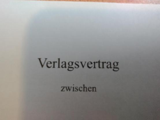 Fotos vom Verlagsvertrag