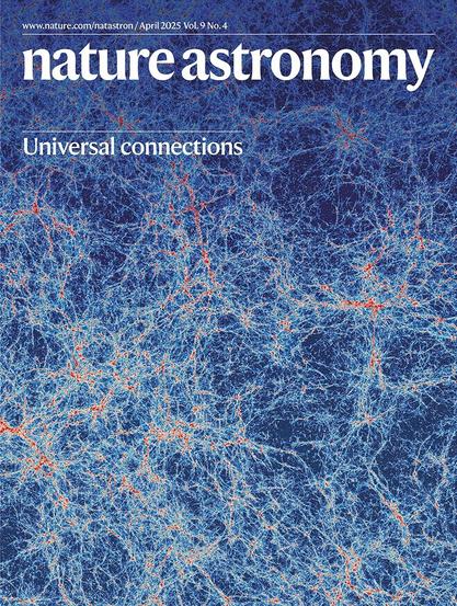 A cover of the Nature Astronomy journal, dated April 2025, Volume 9, issue 4, featuring a colorful visualization of the filamentary structure of the Cosmic Web linking galaxies together. Color palette runs from blue for underdense to red for overdense. Title reads "Universal connections".