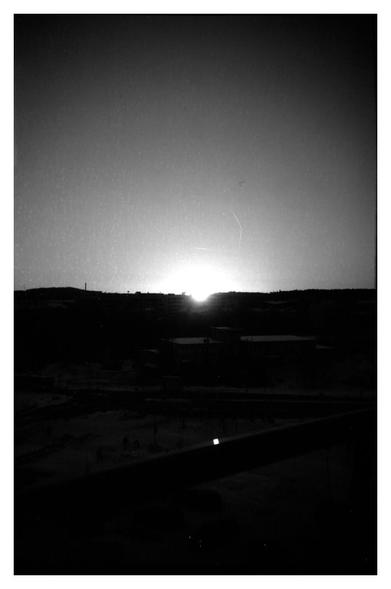 The first rays of the rising winter sun. A timed exposure photo taken from my 'french'  balcony.