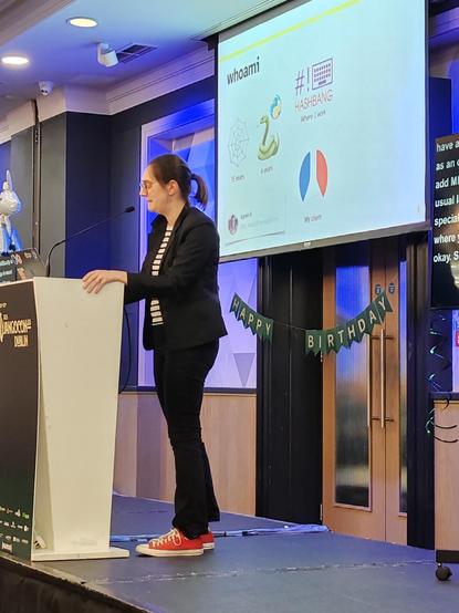 Agnès on stage at DjangoCon Europe giving her talk