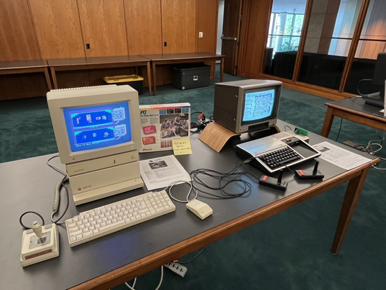 An Apple IIgs next to a Texas Instruments TI-99/4a