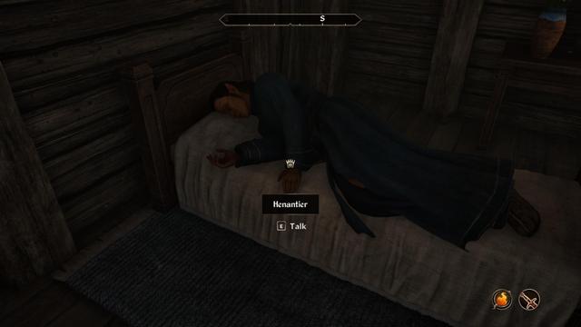 Henantier, asleep on his bed, his face contorting randomly. Henantier is an high-elf.