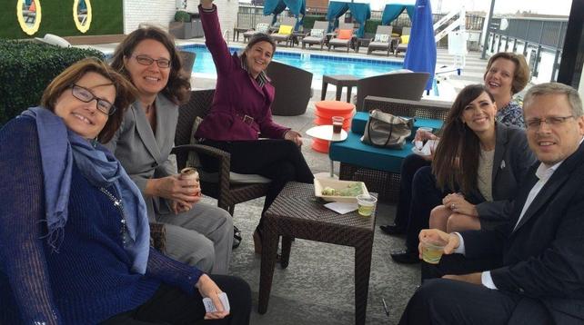 Bringing people together: photograph of a few attendees at a 2014 meetup I organized for friends and peers in Washington, DC