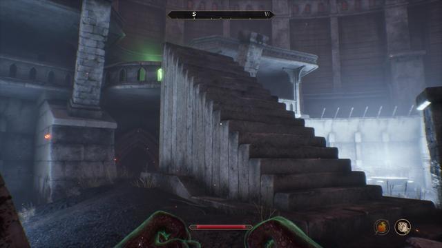 A staricase rises from the grount to the balcony leading to the green orb.