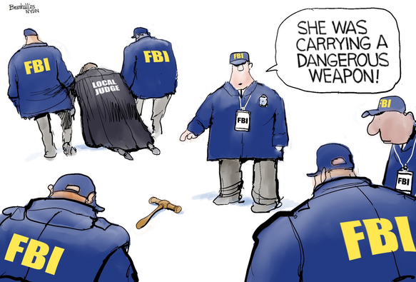 Cartoon of the FBI arresting a "local judge." One FBI agent points to the judge's gavel and says, "She was carrying a dangerous weapon." 