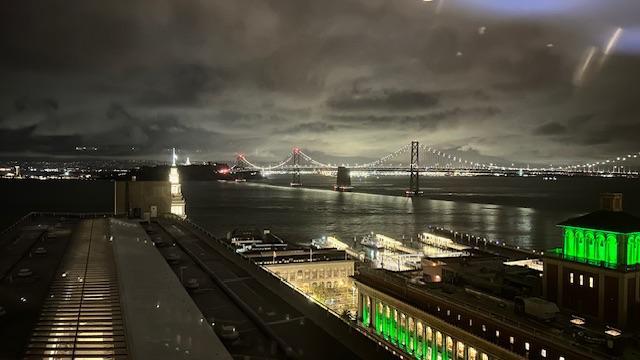 Night view of San Francisco Bay from rooftop revolving club 