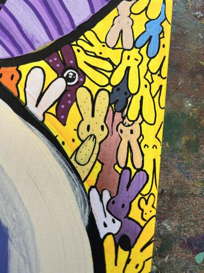 a detail of a painting by dej of lots of cute small bunnies in all kinds of positions and colors. one has some speckles, one is shimmery, one is winking, and one has a really big eye. 