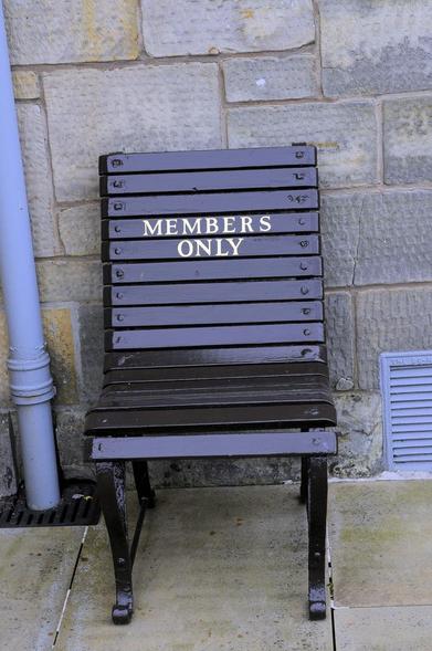 unmembership: photograph of an outdoor chair with the words "MEMBERS ONLY" written on the chair back