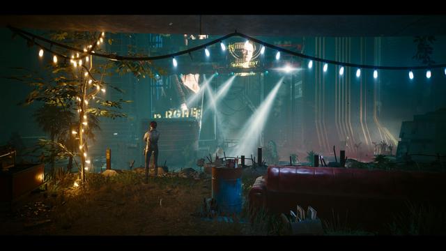 A futuristic, dystopian scene featuring a figure standing amidst overgrown plants and debris. Dim lighting highlights an old red couch and a blue barrel. Bright beams of light and neon signs create a contrasting atmosphere in the background.