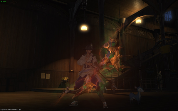 A character from Final Fantasy XIV stands in a dimly lit, ornate, wood-paneled room. The character is dressed in a Renaissance-style outfit with a feathered hat, holding a large, ornate bow which is enveloped by intense orange energy and a subtle green glow. In the background, stairs lead to an upper level, and other characters and a small, deer-like fae creature are partially visible.  